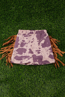  COW SPOTTED FAUX SUEDE SKIRT W/ SIDE FRINGE. DRG251123098-AMY