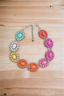  Multi-color concho belt. C-2024